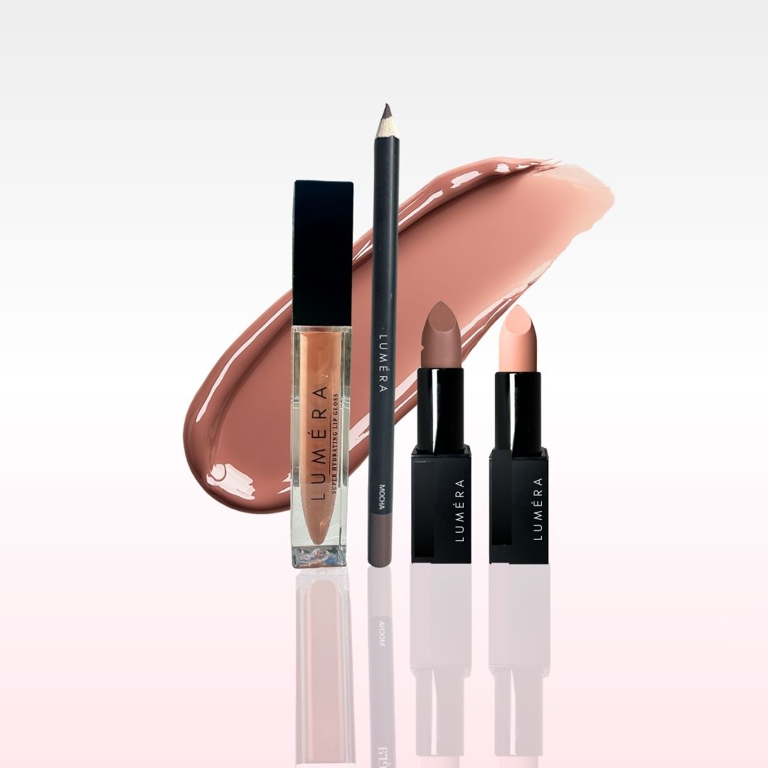 Lumera lip products including a lip gloss, lip liner, and lipstick on a light pink background.