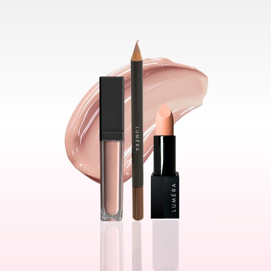 Lumiera lip products including a lip gloss, lip liner, and lipstick on a white background.