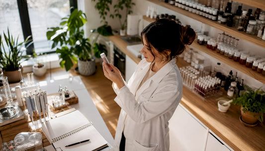 Chemist examining lip plumper ingredients in lab