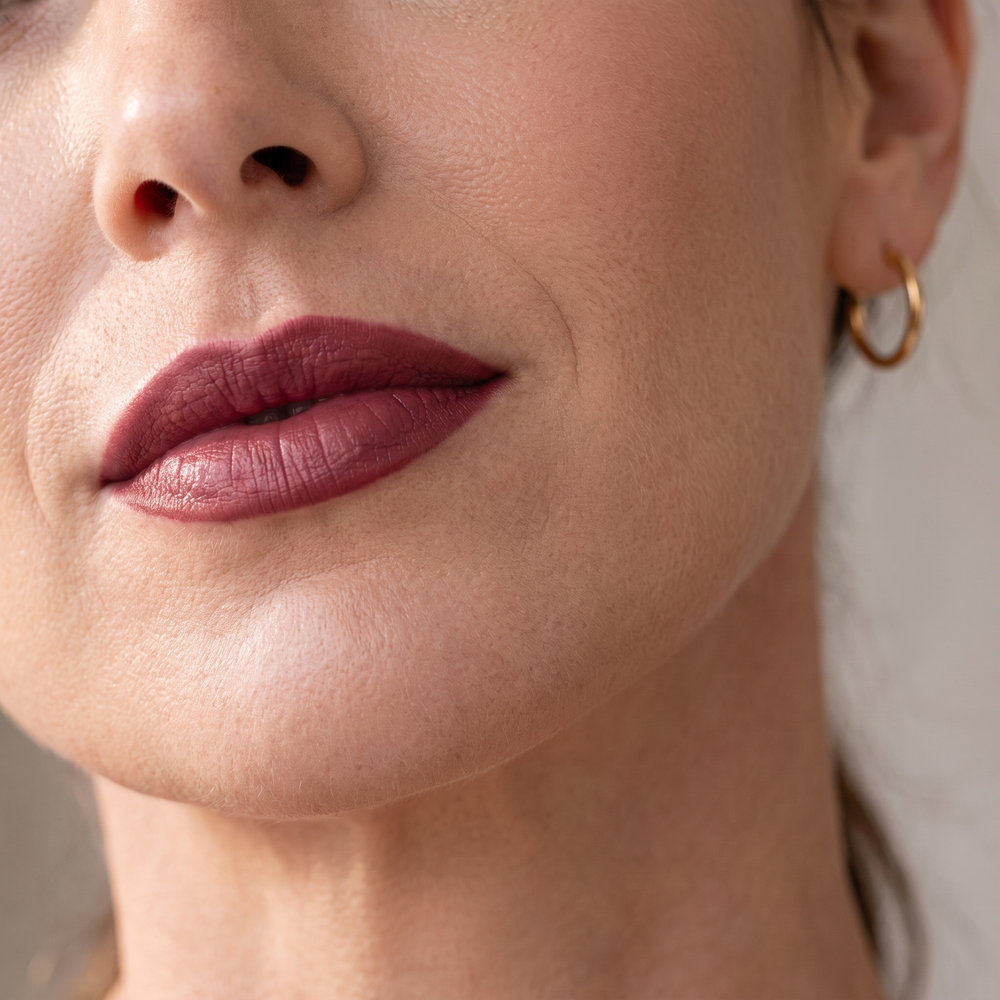 Berry lip liner on model