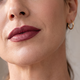 Berry lip liner on model
